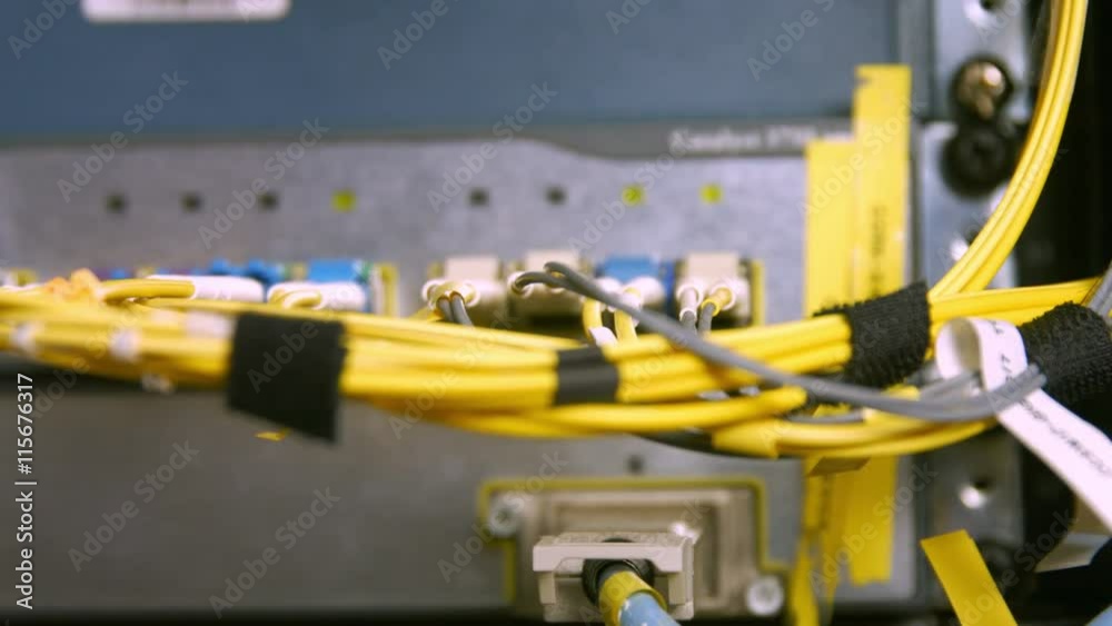 Wires and cables coming out of server Wires and cables coming out of server