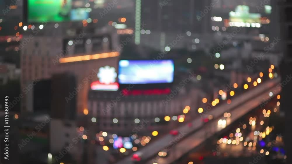 night city lights and traffic in Bangkok as abstract background. Out of focus with blurry car and building light, bird eyes high angle view night city lights and traffic in Bangkok as abstract background. Out of focus with blurry car and building light, bird eyes high angle view