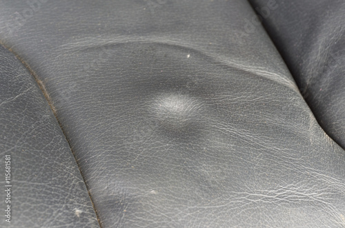 Dent on leather seat