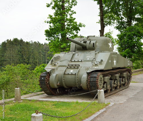 Sherman tank monument in Belgium Ardennes on the river Maas photo