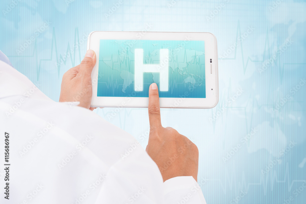 Doctor hand touch screen Hospital symbol on a tablet. medical icon Doctor hand touch screen Hospital symbol on a tablet. medical icon