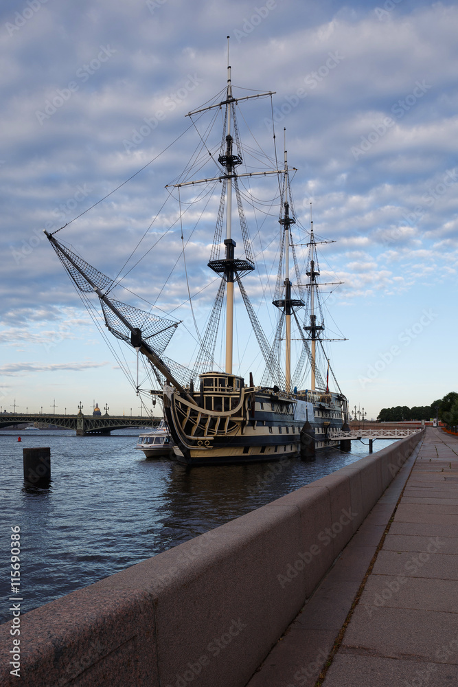 Sailboat on Petrovsky quay in the center of St. Petersburg Sailboat on Petrovsky quay in the center of St. Petersburg