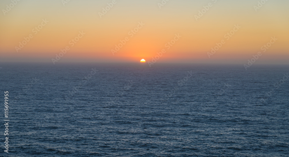 Fototapeta premium Sunset over sea