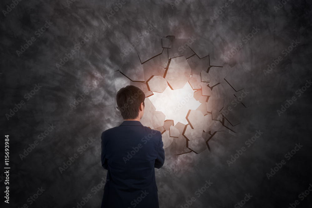 businessman breaking trough a wall, business concept businessman breaking trough a wall, business concept