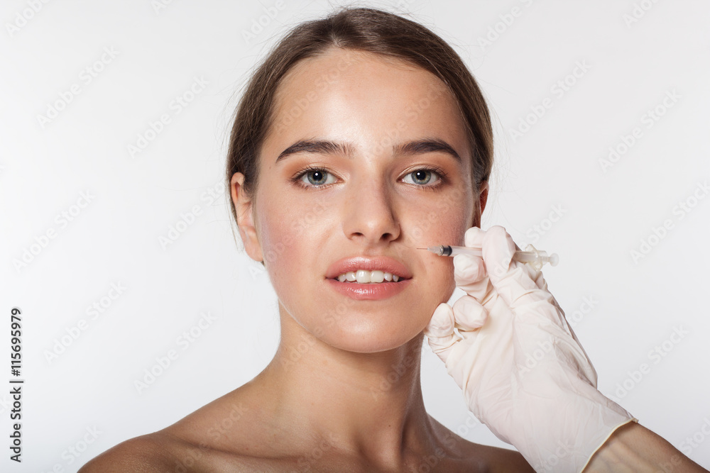 Girl getting beauty injection for face
