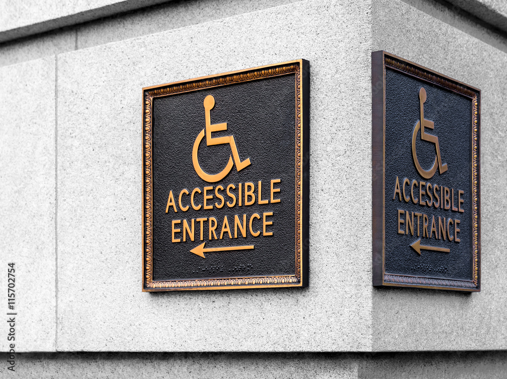 Fototapeta premium sign pointer direction motion the wheelchair on the building cor