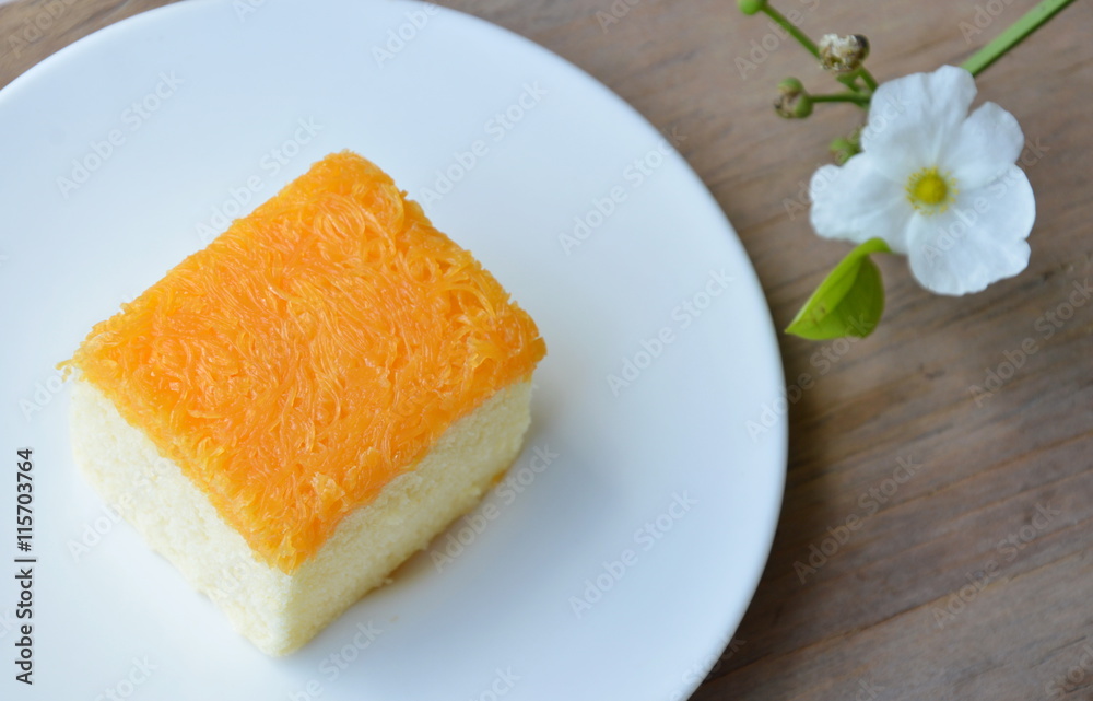 butter cake topping golden egg strips on dish butter cake topping golden egg strips on dish