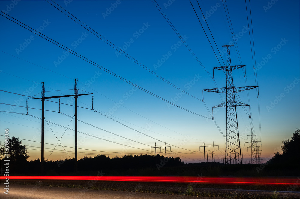 Power Line. pylon against a blue sky.