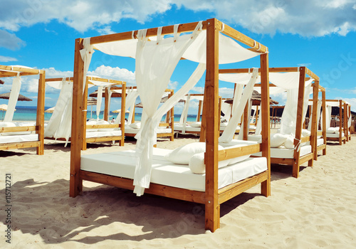 beds in a beach club in Ibiza, Spain photo