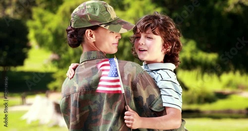 Soldier reunited with her son on a sunny day
