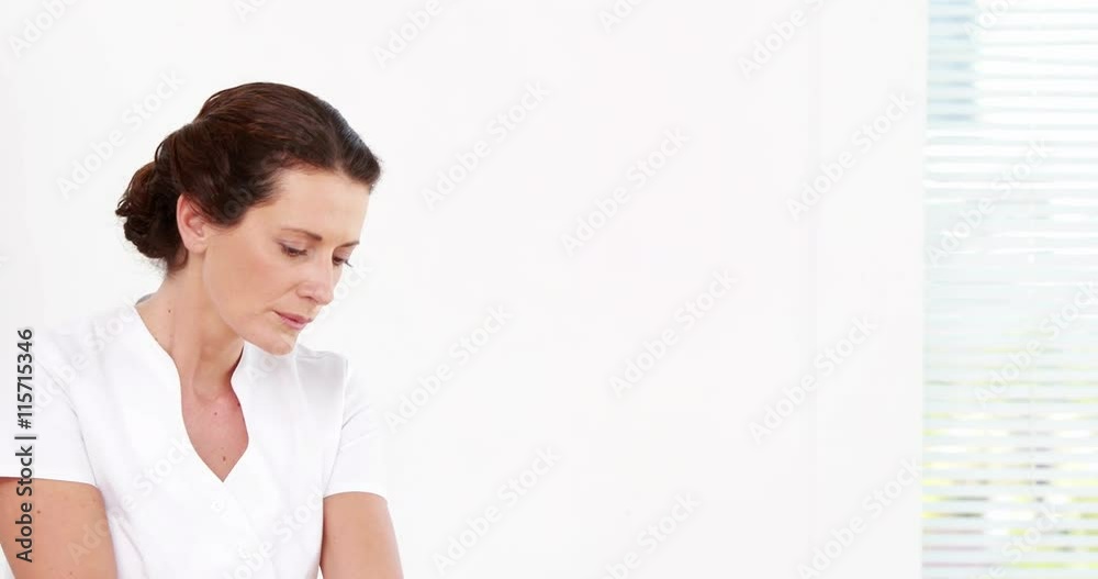 Physiotherapist giving sports massage to patient Physiotherapist giving sports massage to patient