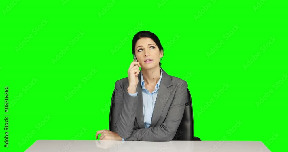 Businesswoman on a phone call on green screen Businesswoman on a phone call on green screen
