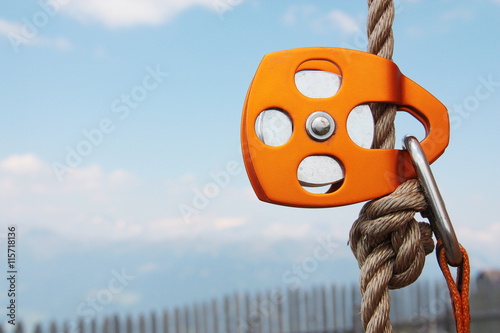 Orange Climbing Pulley with rope and carabiner