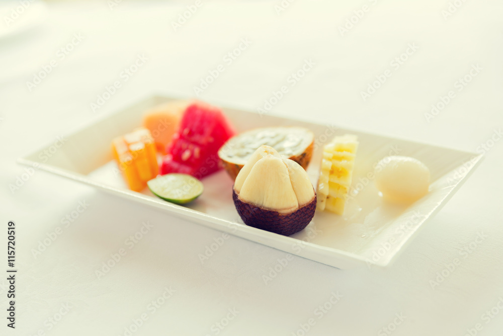 plate of fresh juicy fruit dessert at restaurant