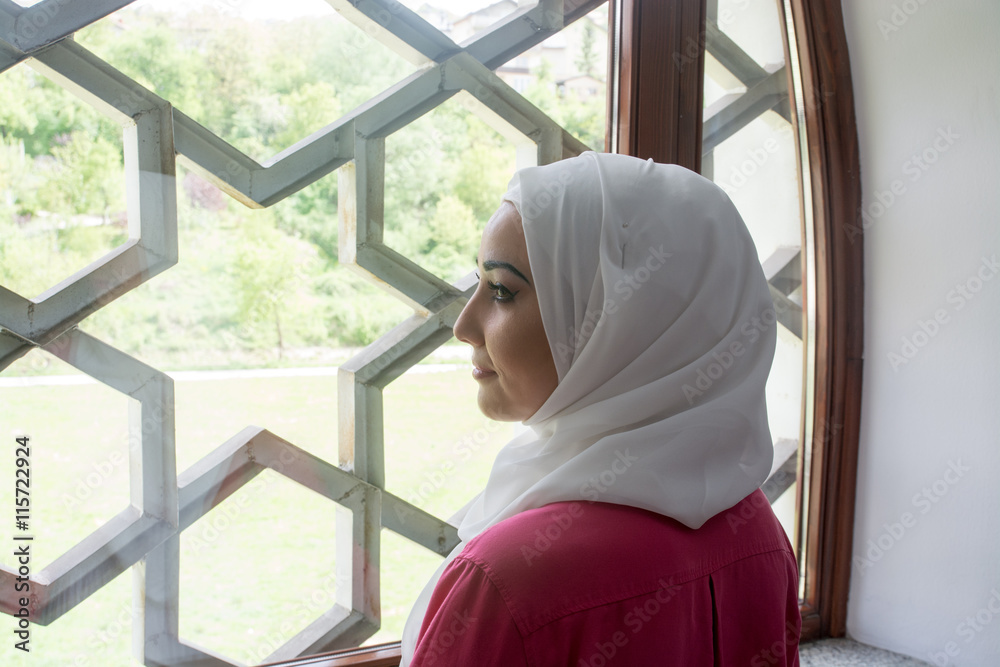 Fototapeta premium Young muslim woman in mosque