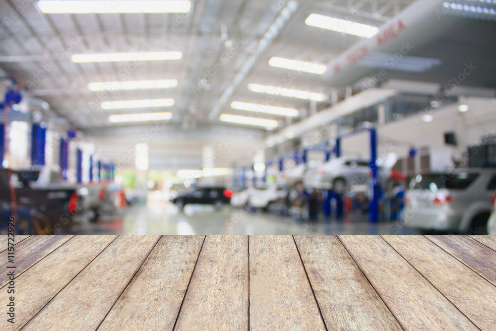 Wood table top with blur garage background Wood table top with blur garage background