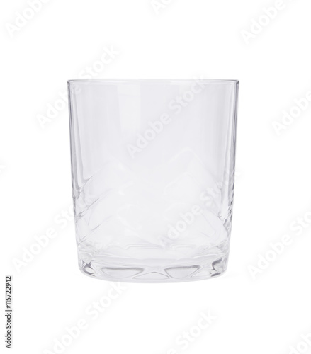 An empty etched glass tumbler isolated on a white background