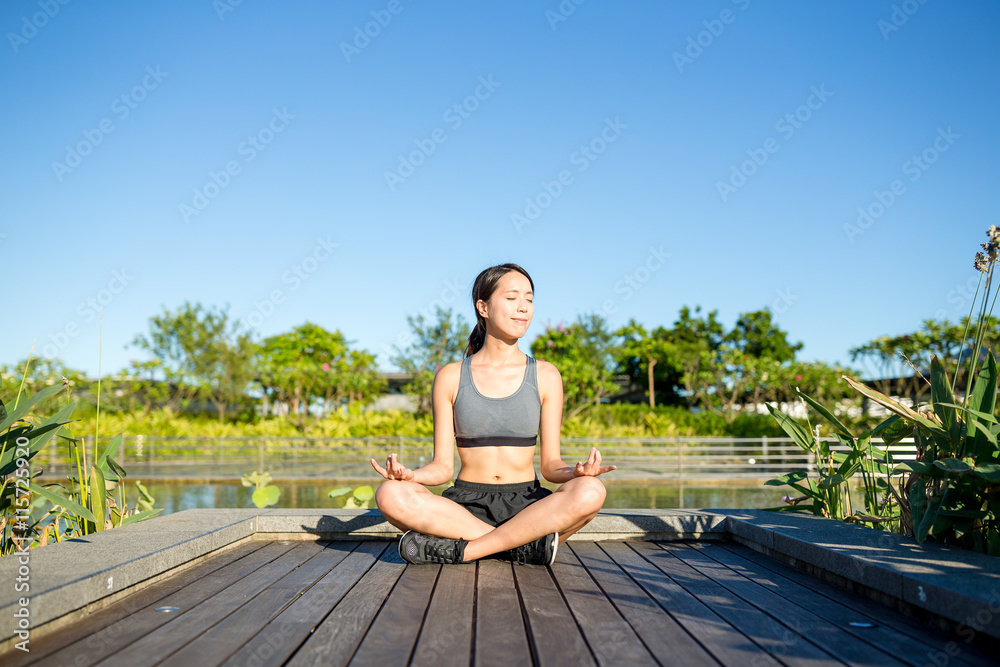 Young woman doing yoga exercise outdoor Young woman doing yoga exercise outdoor