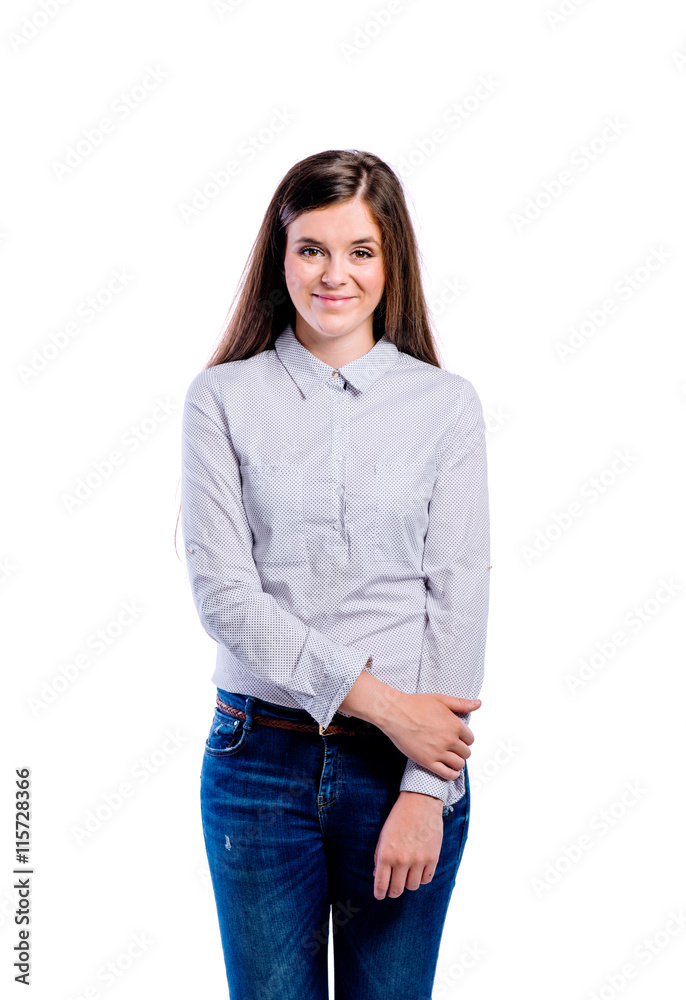 Girl in dotted shirt, young beautiful woman, studio shot Girl in dotted shirt, young beautiful woman, studio shot