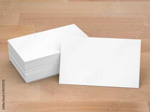 stack of white blank name card on wooden background