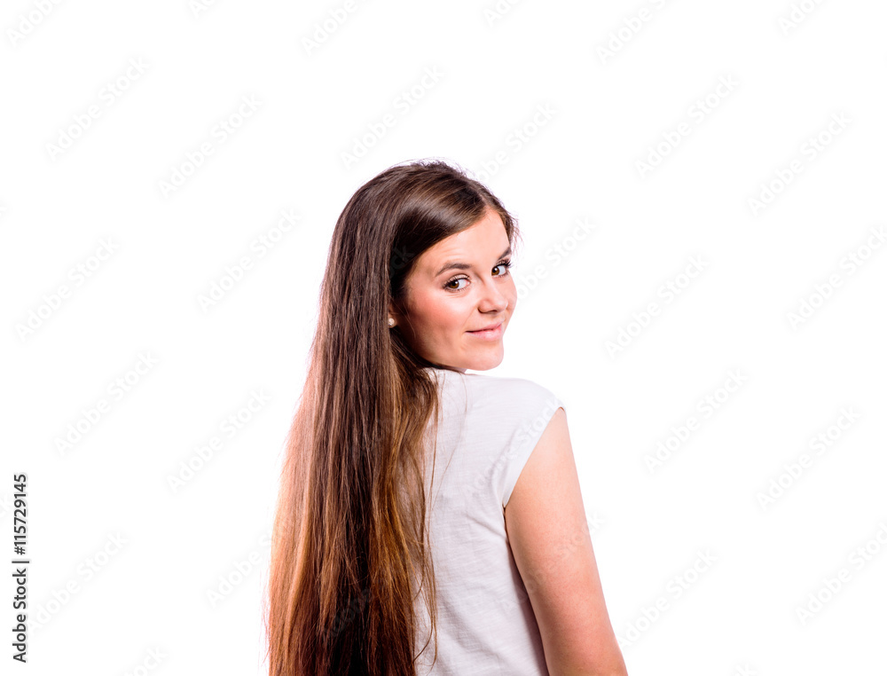 Girl in striped t-shirt, young beautiful woman, studio shot Girl in striped t-shirt, young beautiful woman, studio shot