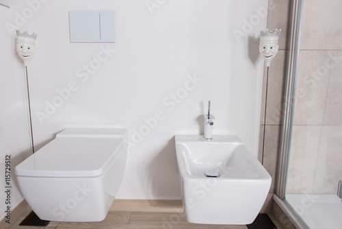 stylish bathroom with bidet and WC in white