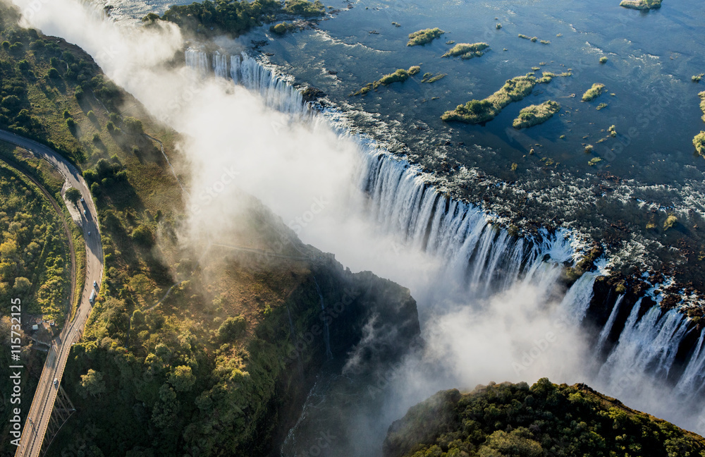View of the Falls from a height of bird flight. Victoria Falls. Mosi-oa-Tunya National park.Zambiya. and World Heritage Site. Zimbabwe.  - obrazy, fototapety, plakaty 