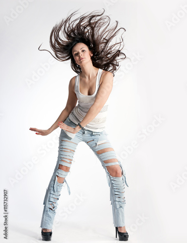  young girl dancing on a white background