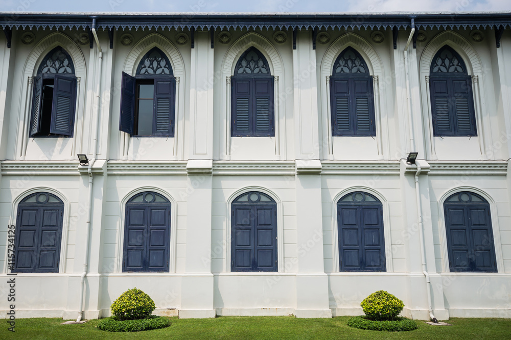 White building with classic windows at Thailand's grand palace