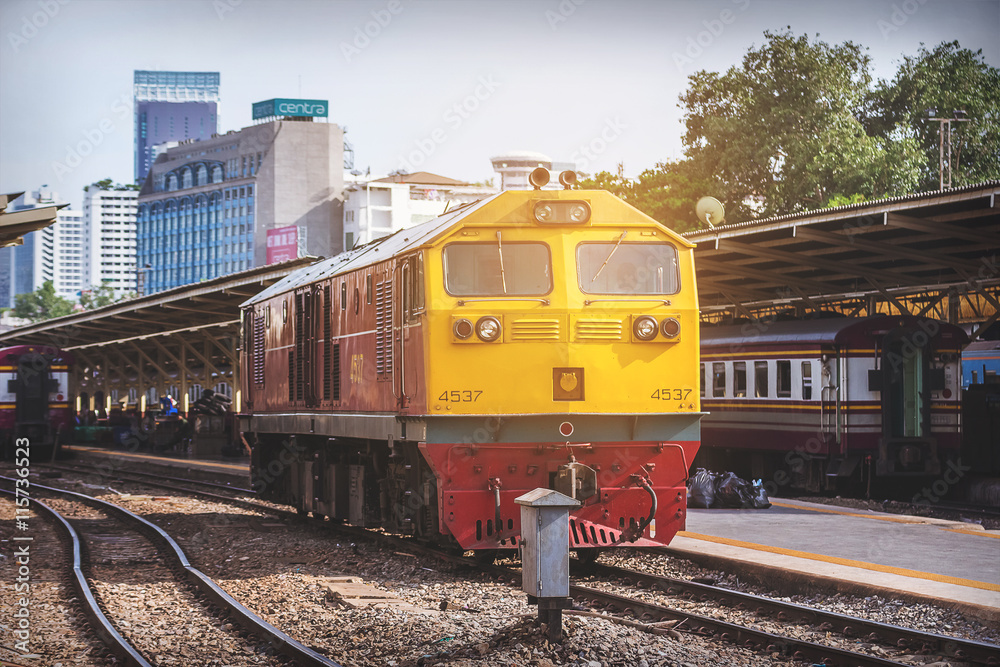Fototapeta premium Hua Lamphong, The old diesel locomotive train running on the tracks. The tracks in the country is extremely old.
