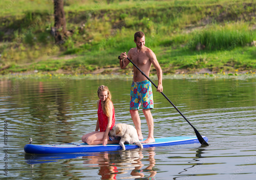 Outdoor recreation. Two in the boat and a dog. Outdoor recreation. Two in the boat and a dog.