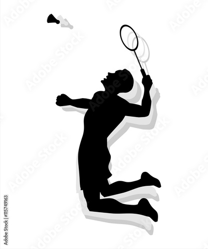 Silhouette of man playing badminton