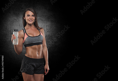 Fitness girl with dumbbells