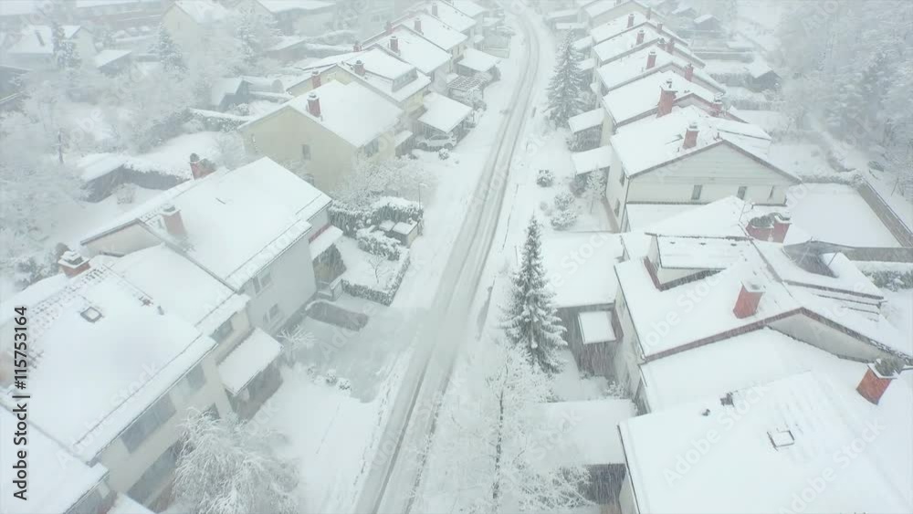 AERIAL: Blizzard in suburban town AERIAL: Blizzard in suburban town