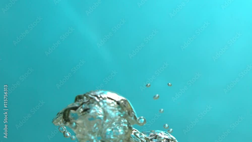 Air Bubbles Floating and Rising up to the Surface in Blue Water in Slow Motion Air Bubbles Floating and Rising up to the Surface in Blue Water in Slow Motion