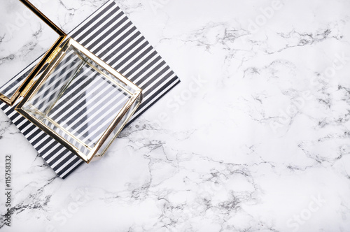 Woman desktop elegant. Flat lay. Gold items on the table. Marble mock-up background. Header or hero website. mock up for artwork .View from above
