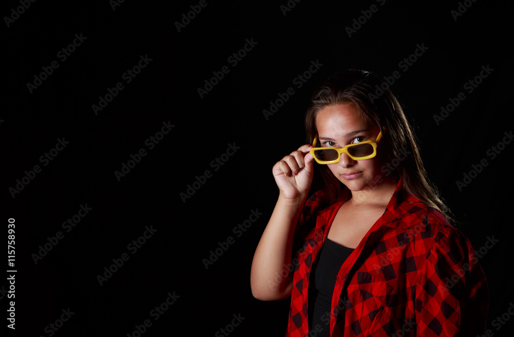 grundge kid with a pair of yellow sunglasses