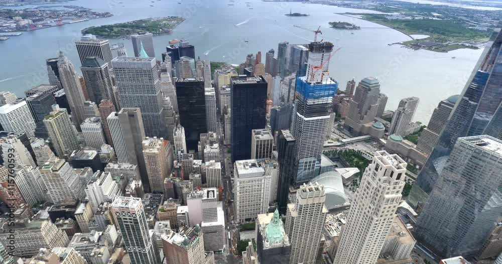 NEW YORK - Circa July, 2016 - An aerial view high above the buildings of New York City's lower Manhattan.  	