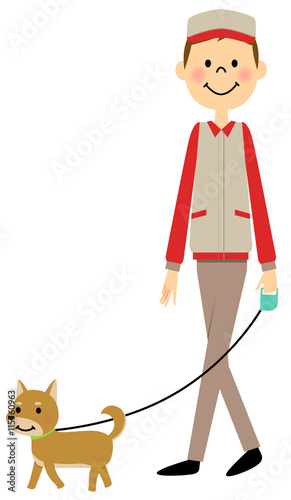 犬の散歩をする作業服の男性