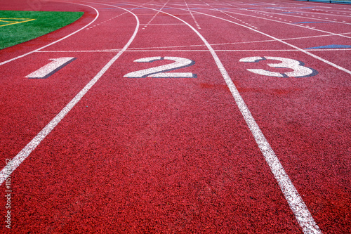 Track and field starting lane numbers 1-3.