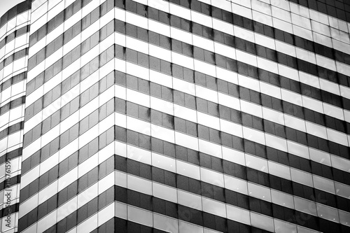 windows of business building on black and white color 