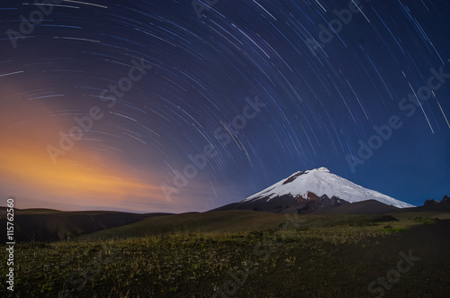 The Cotopaxi volcano in Ecuador, night shot with star trails photo
