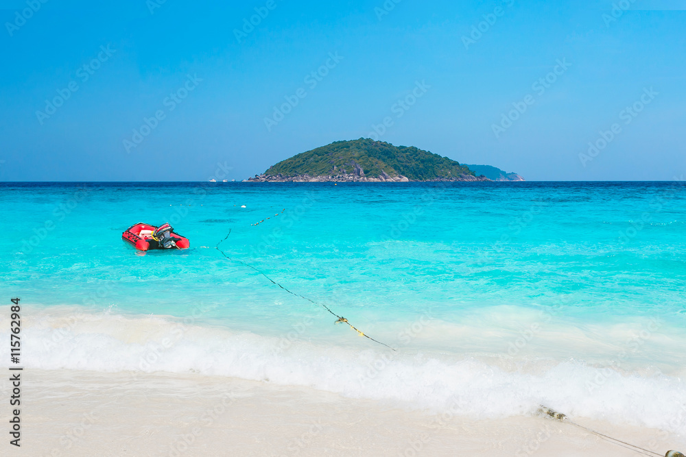 Beautiful tropical seascape. Crystal clear sea and white sand beach at Tachai island, Andaman, Phang-nga, Thailand.