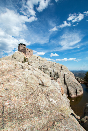 Harney Peak Fire Lookout Tower and pump house with small dam in Custer State Park in the Black Hills of South Dakota USA