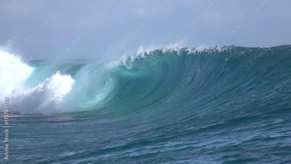 SLOW MOTION CLOSE UP: Big Teahopoo wave breaking and splashing SLOW MOTION CLOSE UP: Big Teahopoo wave breaking and splashing