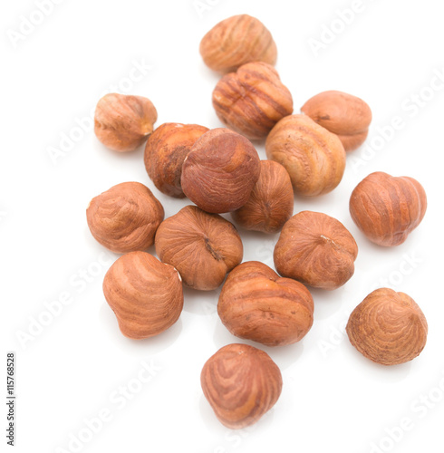 hazelnut kernels on a white background
