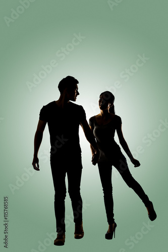 Silhouette of young Asian couple