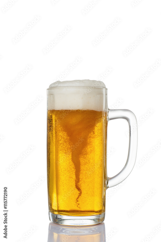 Frosty glass of light beer with whirlpool isolated on a white background Frosty glass of light beer with whirlpool isolated on a white background