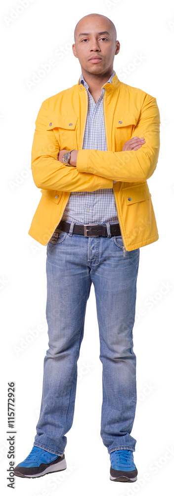 Cutout confident young man standing in full growth. His arms are crossed across the chest. Full length portrait. Isolated on white background. Cutout confident young man standing in full growth. His arms are crossed across the chest. Full length portrait. Isolated on white background.