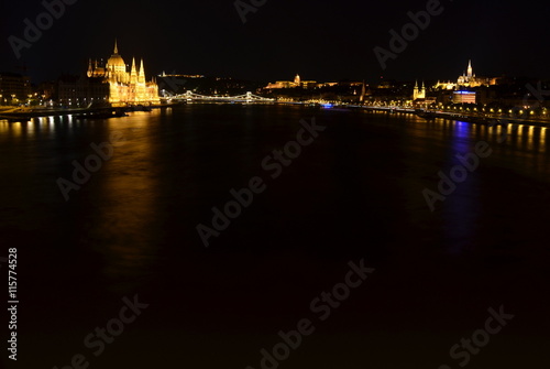 Hungarian landmarks, Hungarian Parliament, Chain Bridge, Royal Palace, Citadella and Danube river in Budapest at night.
